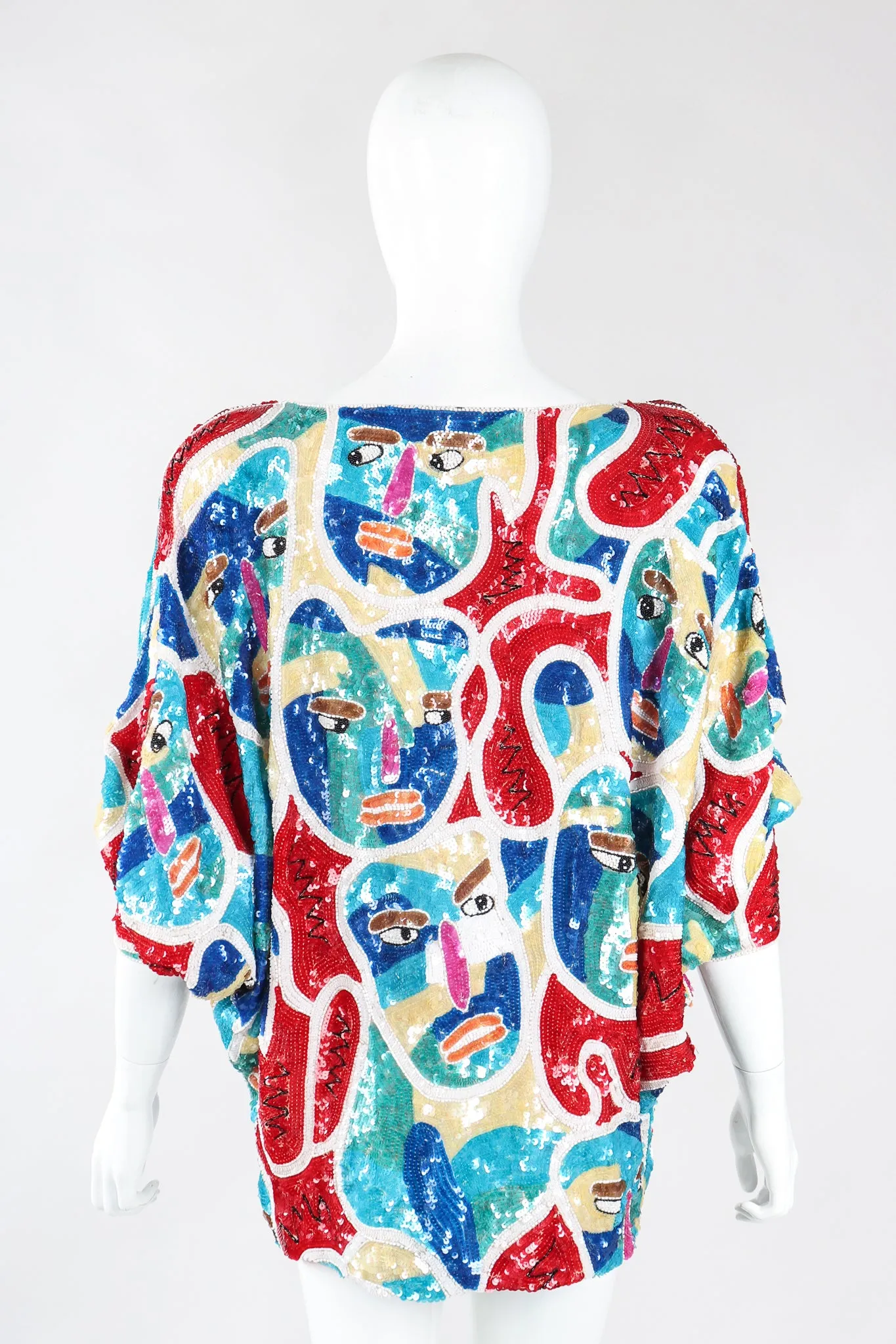 Abstract Faces Dolman Tunic