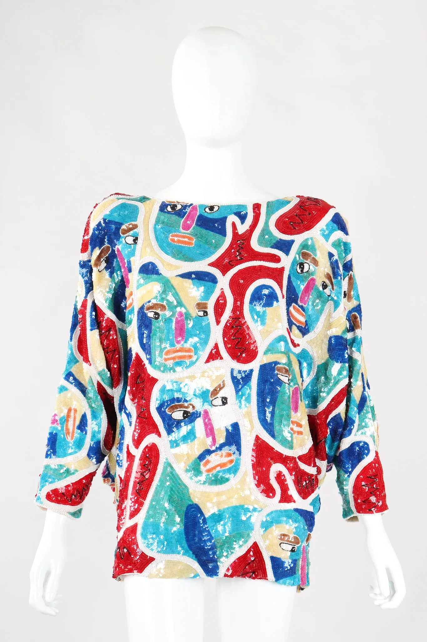 Abstract Faces Dolman Tunic