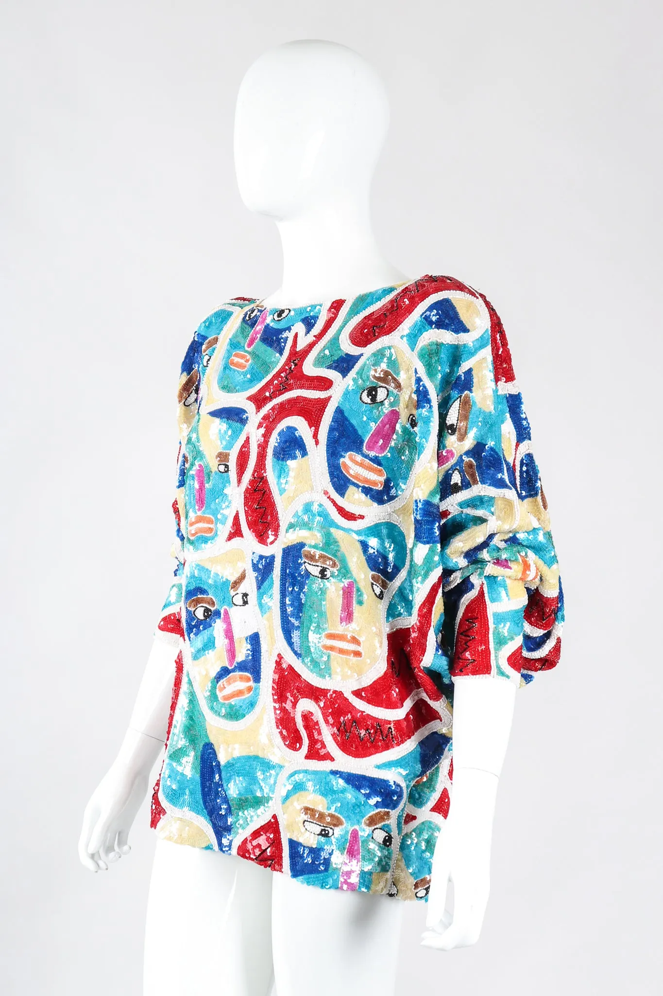 Abstract Faces Dolman Tunic