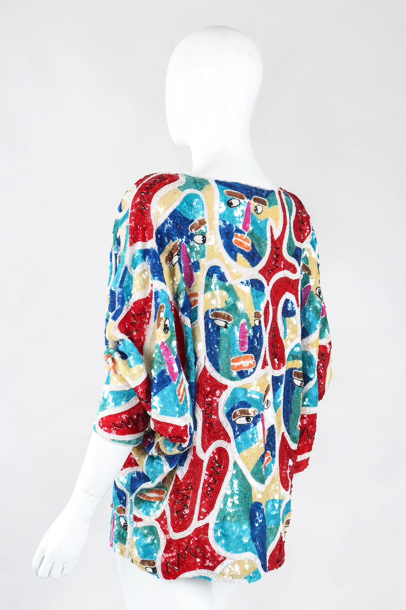 Abstract Faces Dolman Tunic