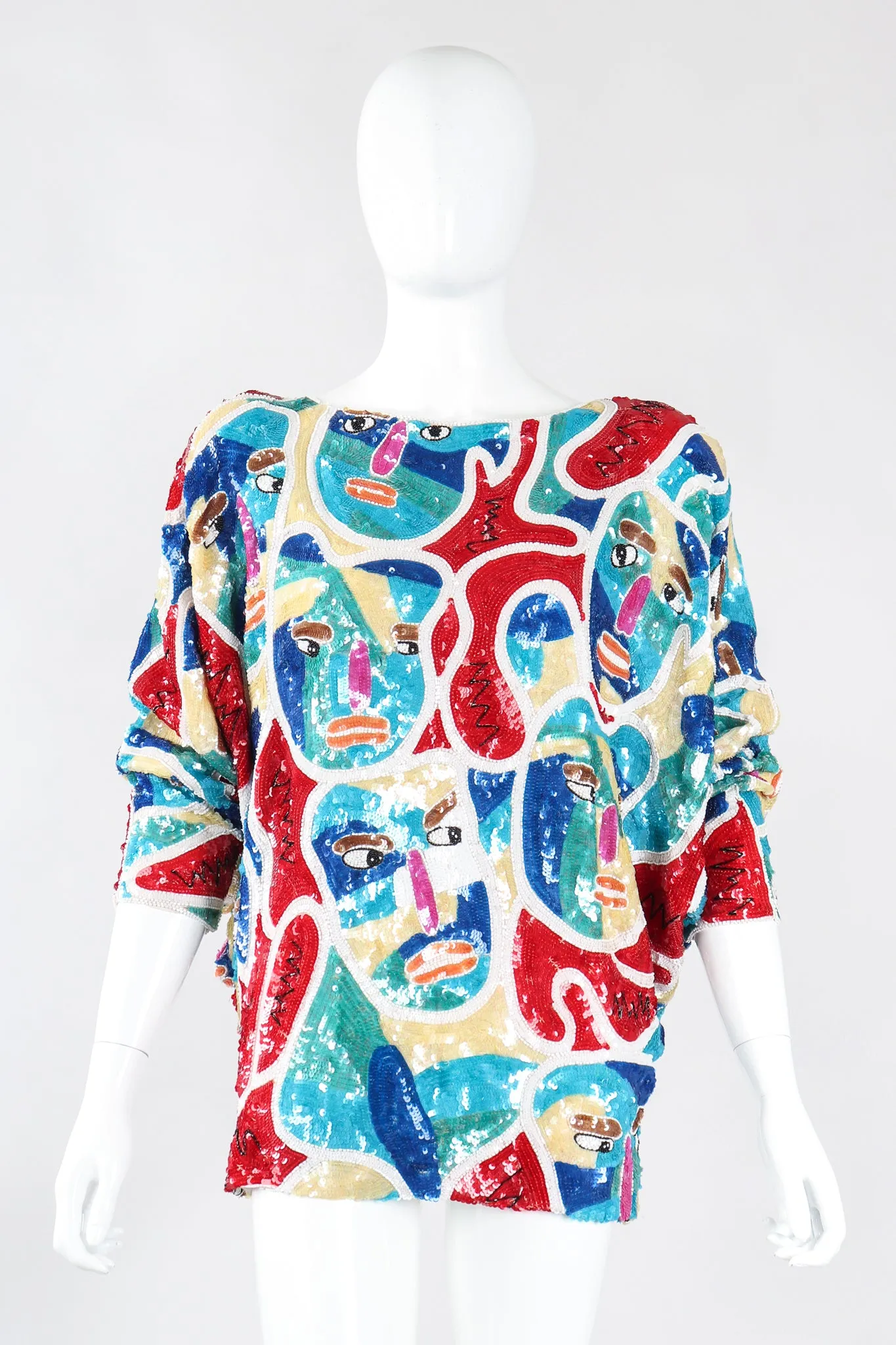 Abstract Faces Dolman Tunic